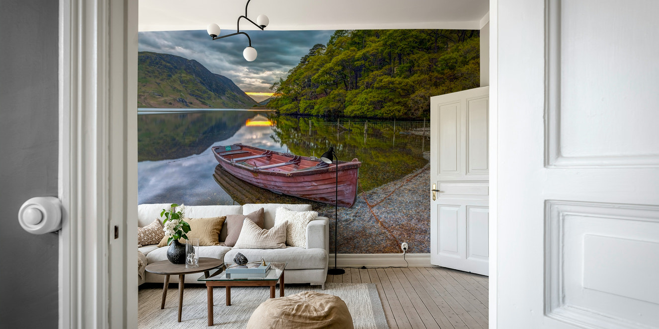 A peaceful wall mural of a small boat on a lake.

