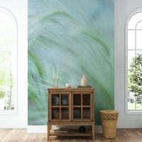 The colors are muted and gentle, like soft greens and browns.

