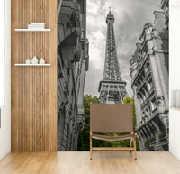 The trees in the foreground are a vibrant green.

