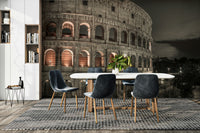 The colors are muted, with the stone's texture and warm interior lights.

