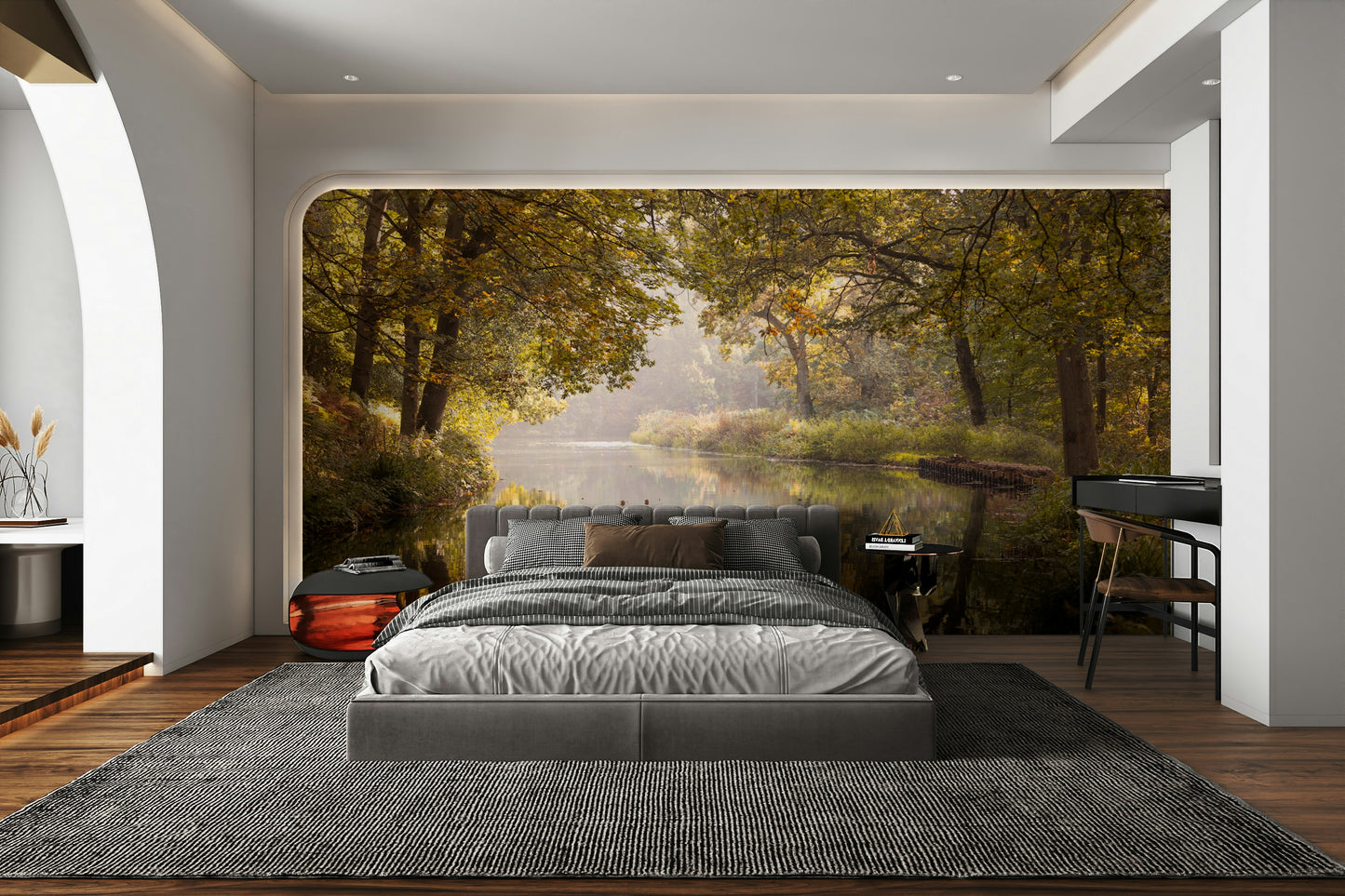 The ground is covered in fallen autumn leaves.

