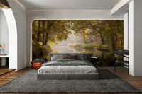 The ground is covered in fallen autumn leaves.

