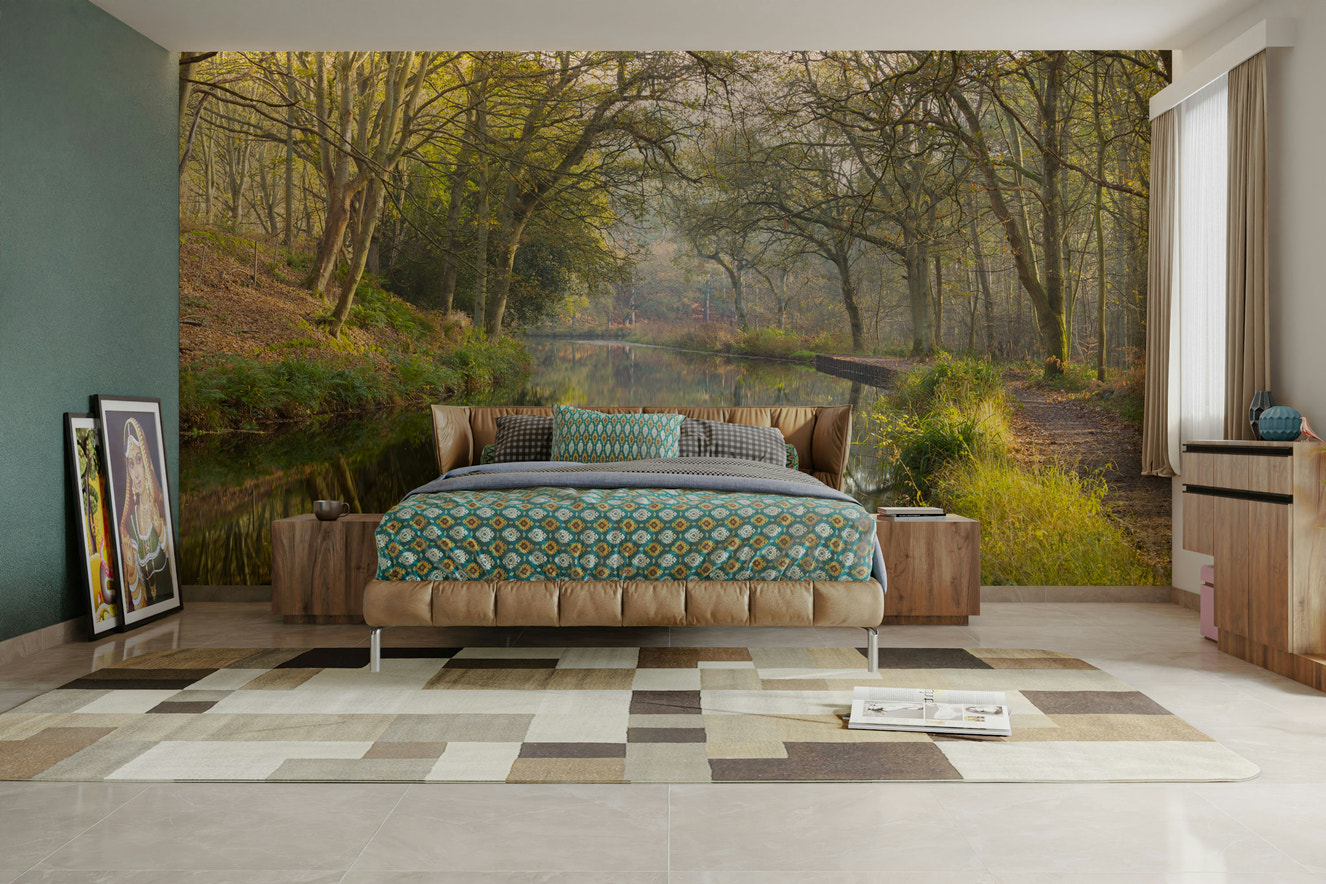 A peaceful wall mural with a forest stream scene.

