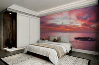 The water is calm and reflects the light.

