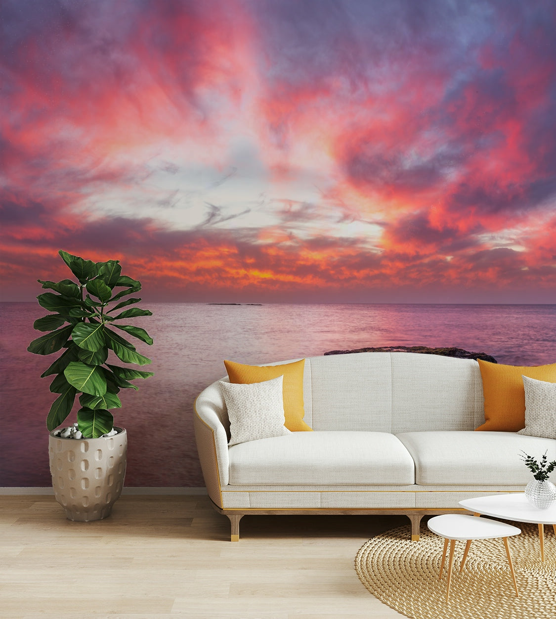 A peaceful wall mural with a sunrise over the ocean.

