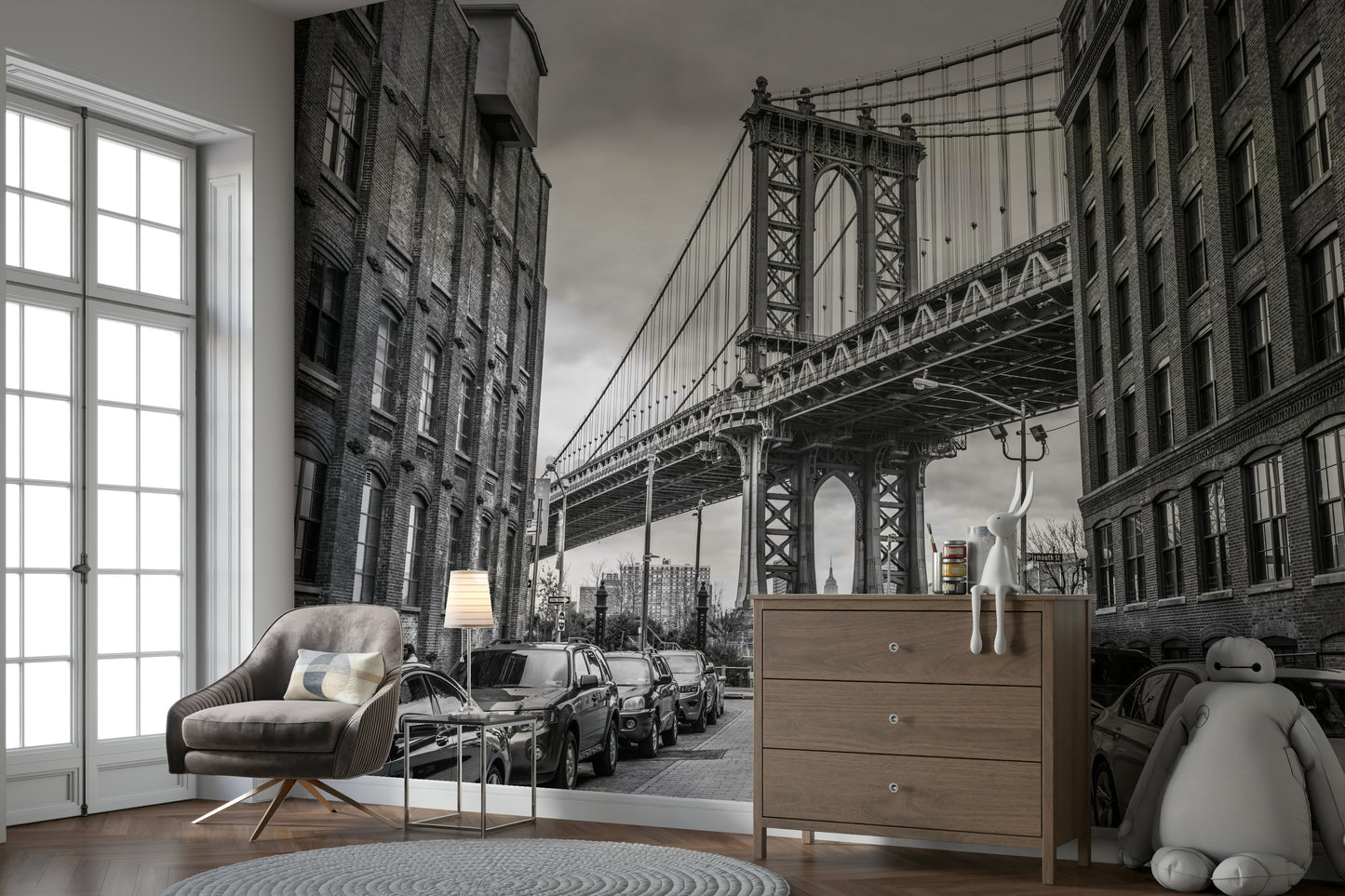 Old brick buildings with many windows line both sides of the street.

