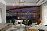 The sky is dark, perhaps with a soft glow from the city.

