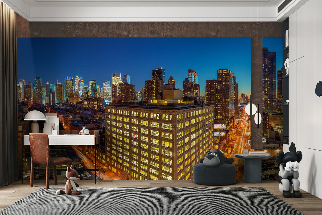 An energetic wall mural with the New York City skyline at night.

