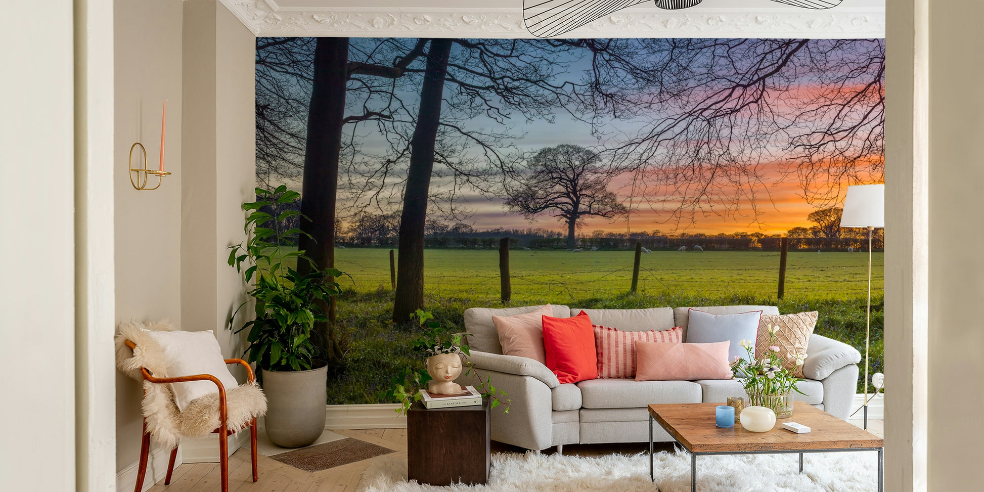 A peaceful wall mural with a field or meadow scene.

