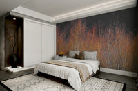 The sun is setting, casting a warm, amber glow on the trees.

