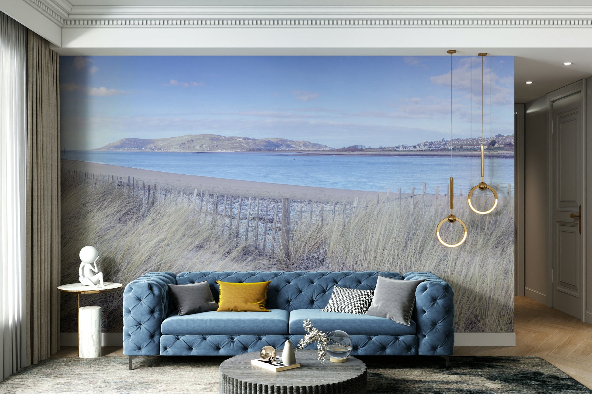 Rolling green hills or cliffs are on the coastline.

