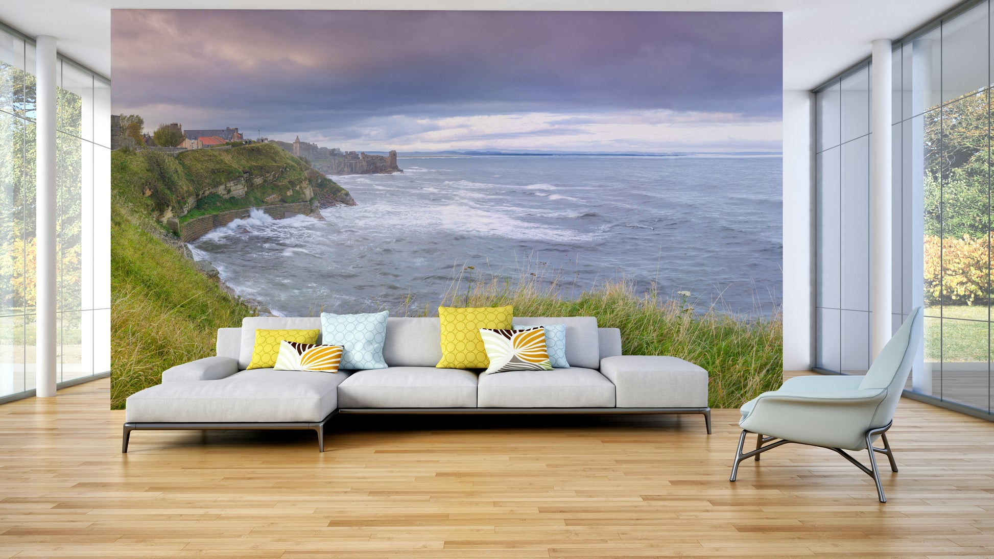 The ocean is visible, with waves crashing on the shore.

