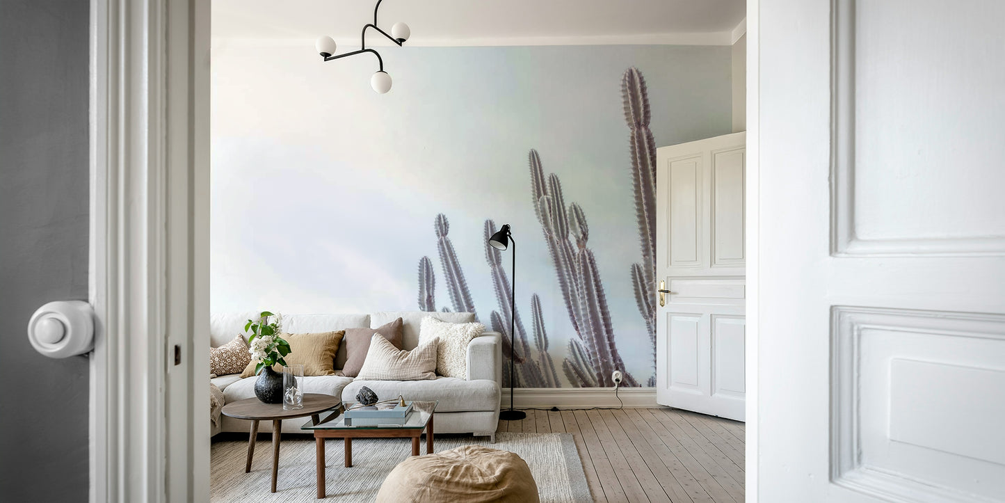 A peaceful wall mural with a desert scene.

