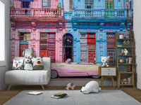 The car is painted in a bright, vibrant color.

