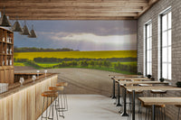 The sky is a mix of soft colors, like yellow, orange, and pink.

