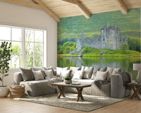 The castle is reflected perfectly in a still body of water.

