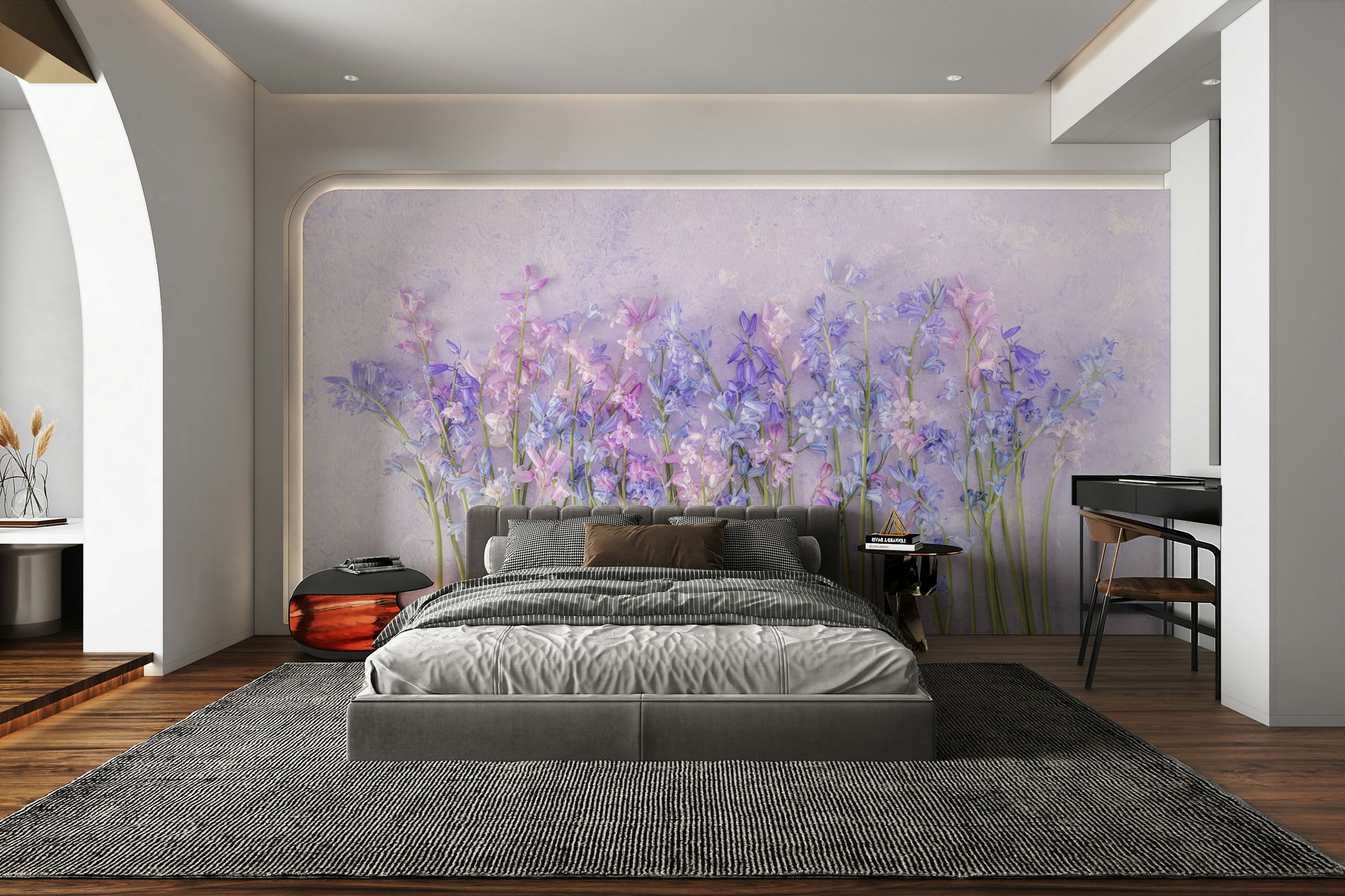 The wallpaper is used as a feature wall in a bedroom.

