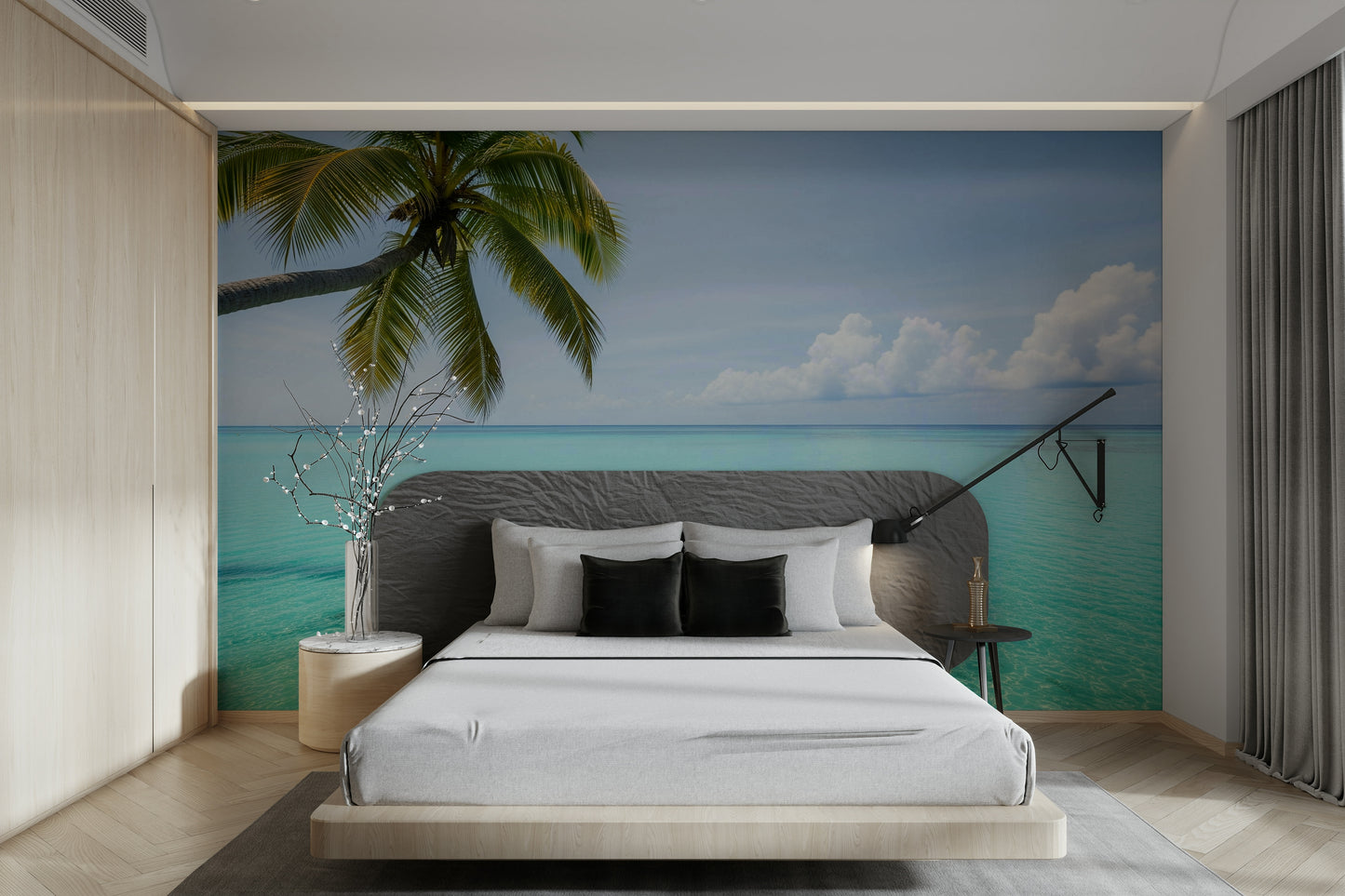 An angled shot of a wall with tropical landscape wallpaper

