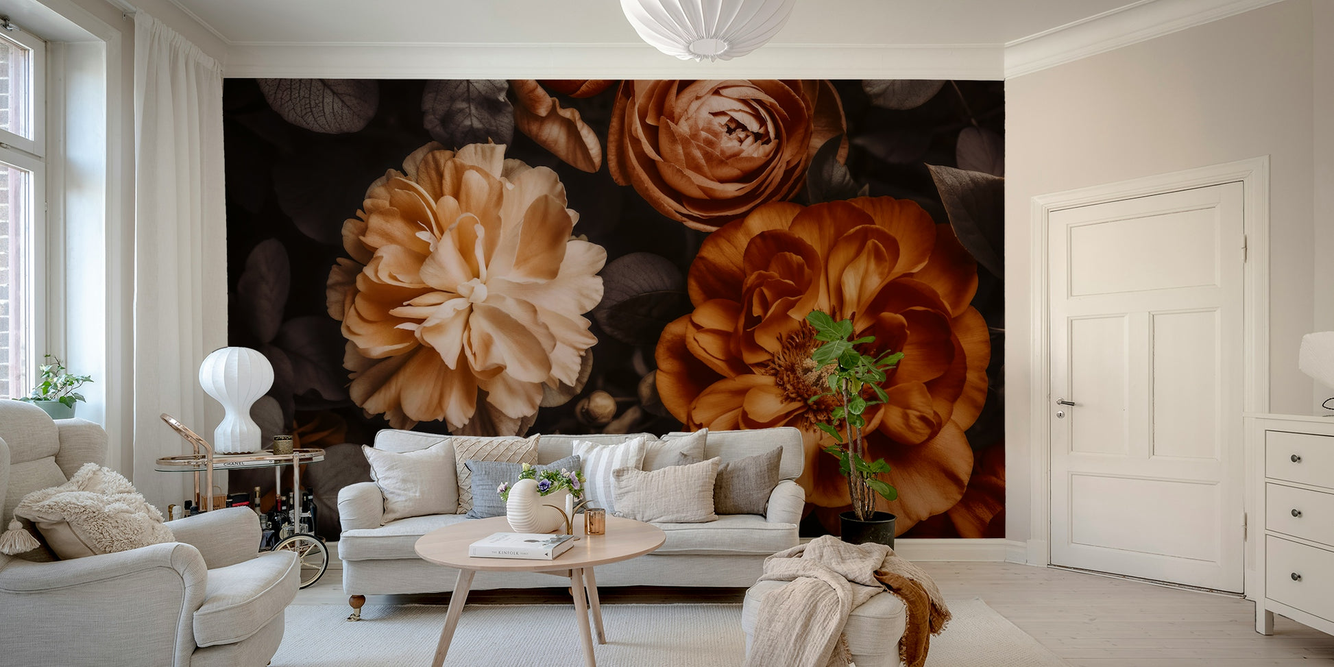 A living room decorated with a floral mural in earthy tones

