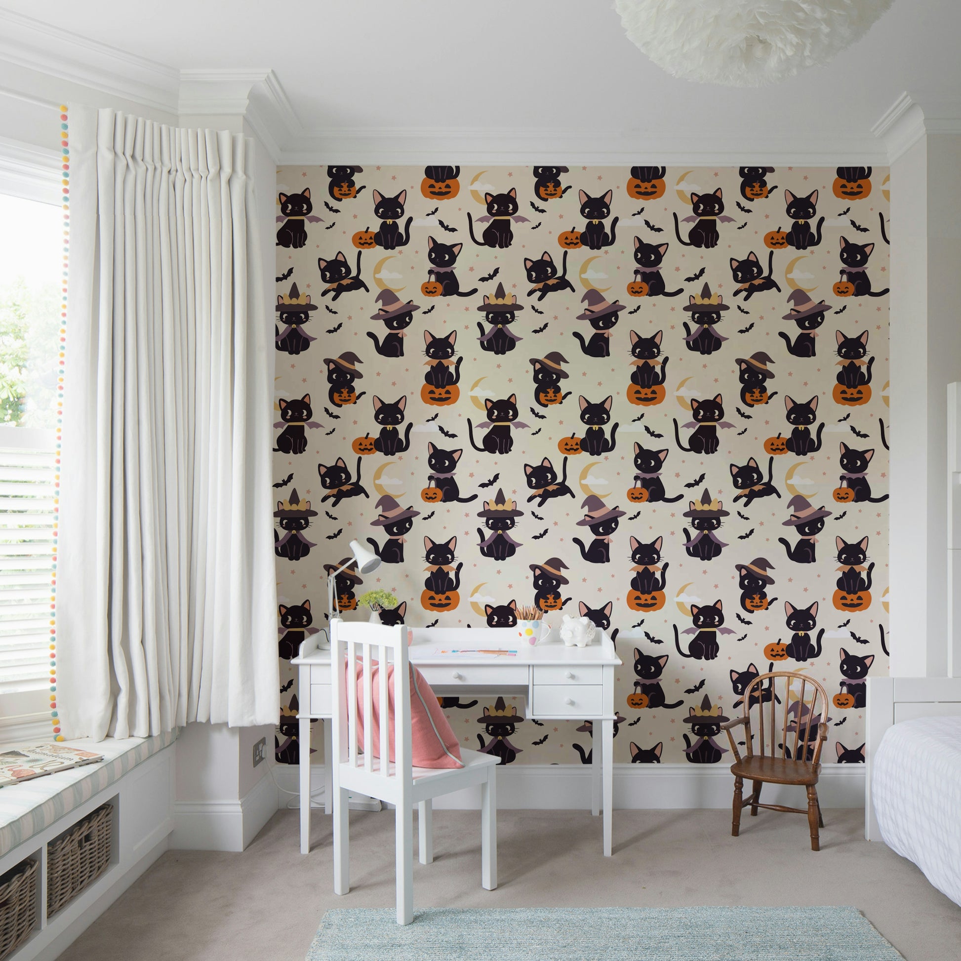 A repeating pattern of cute Halloween cats and pumpkins.
