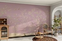 An elegant wall mural with a pattern of birds and flowers.

