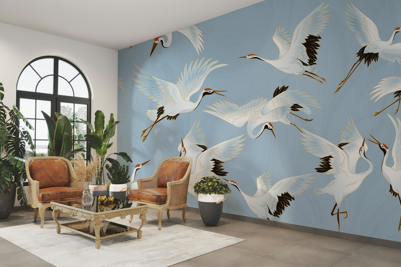 An elegant wall mural with a pattern of cranes.

