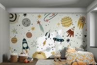 A large planet with a ring is visible.

