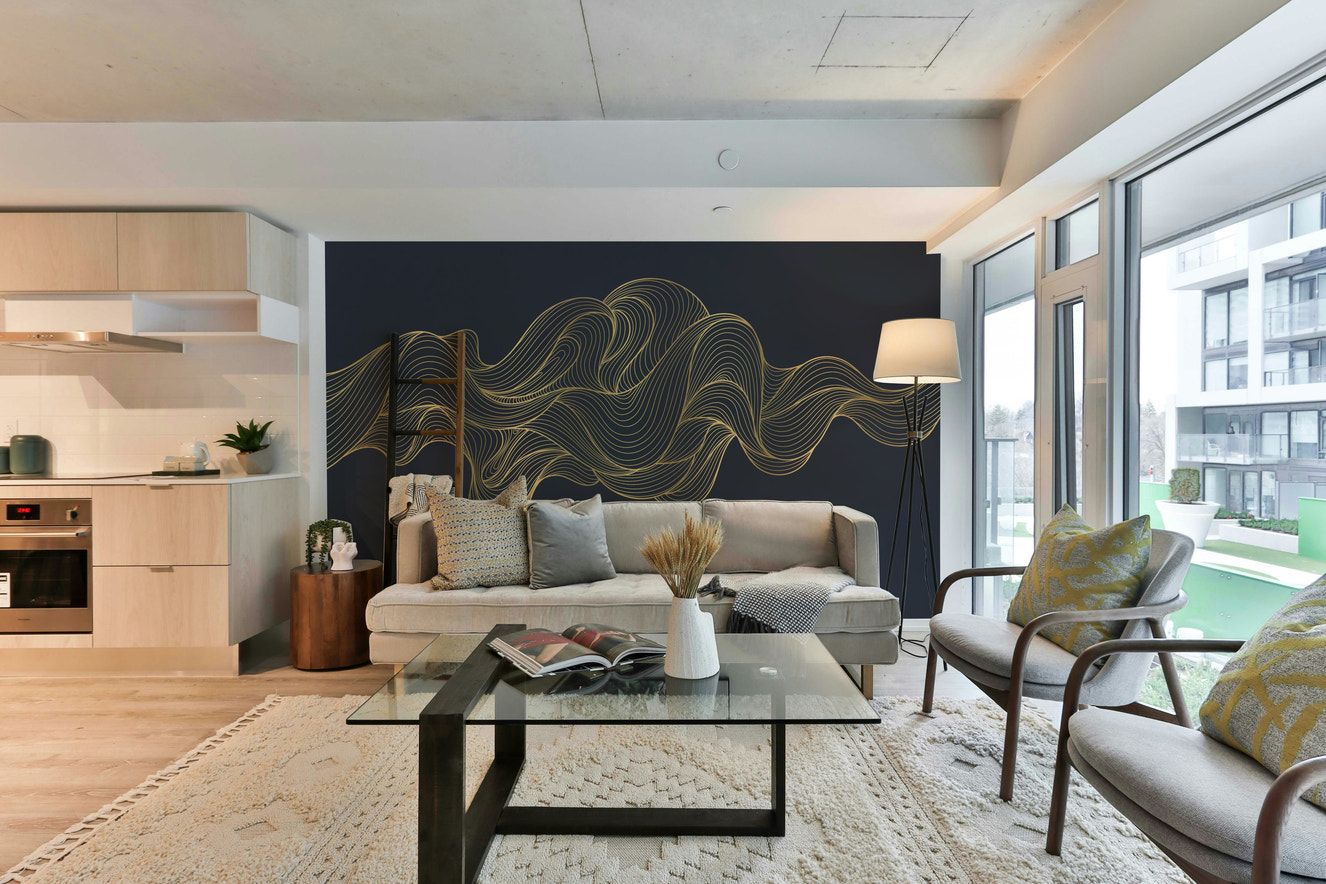 A peaceful wall mural with a soft, flowing golden pattern.

