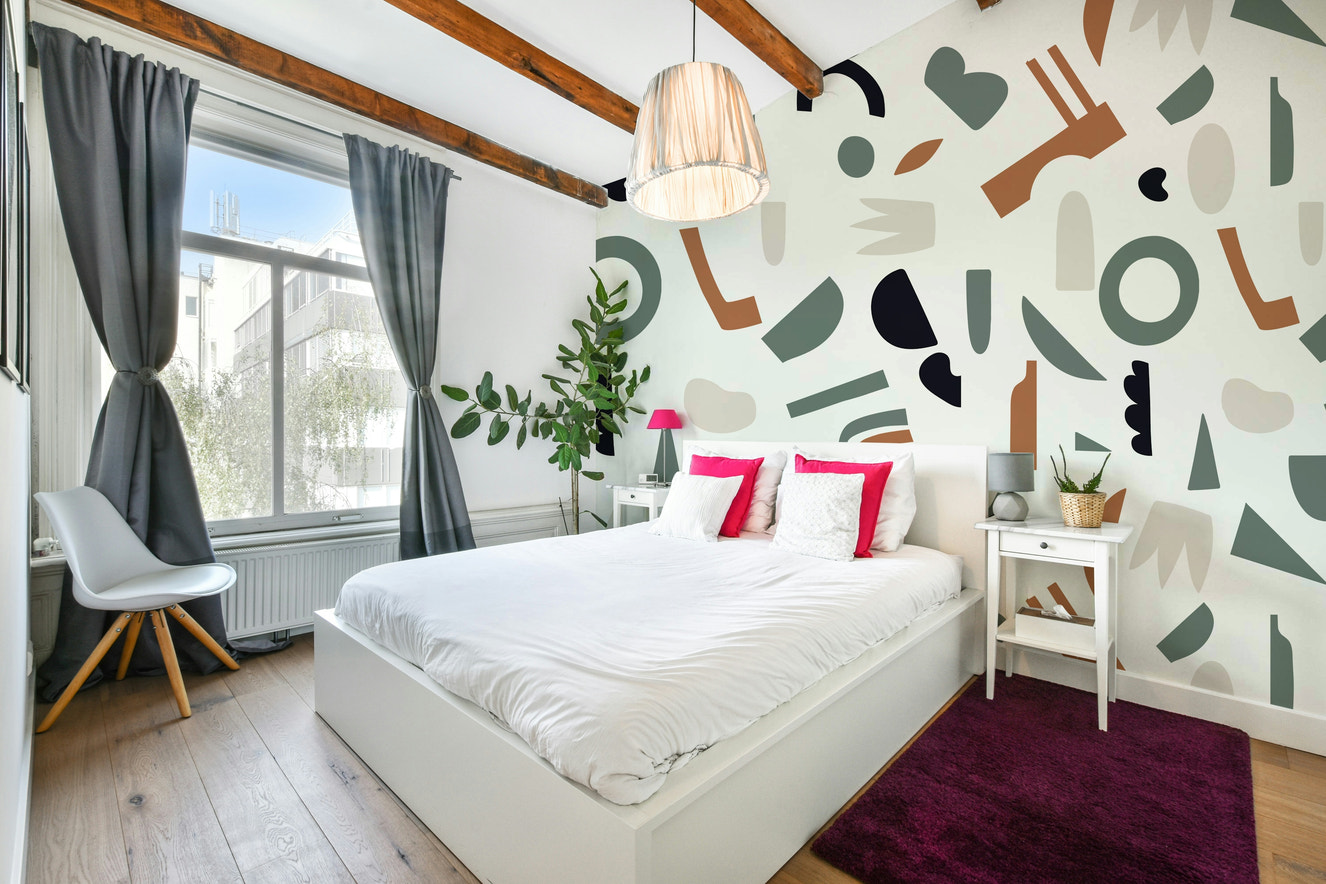 A peaceful wall mural with a modern abstract design.

