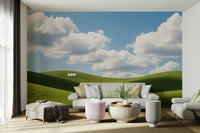 The colors are soft and muted, with various shades of green.

