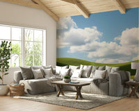 A peaceful wall mural with a charming green landscape.

