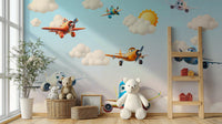 The design features graceful, friendly airplanes flying among clouds.

