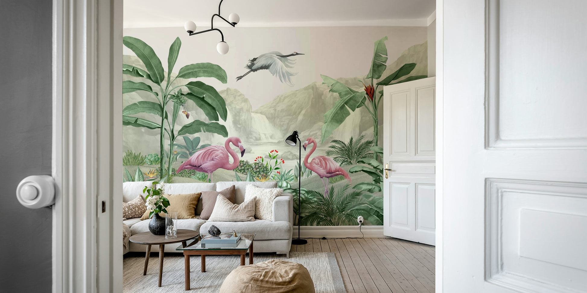 The surrounding area is filled with lush, large-leafed tropical plants.
