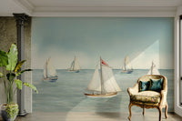 Wall mural with a sailboat and a calm ocean

