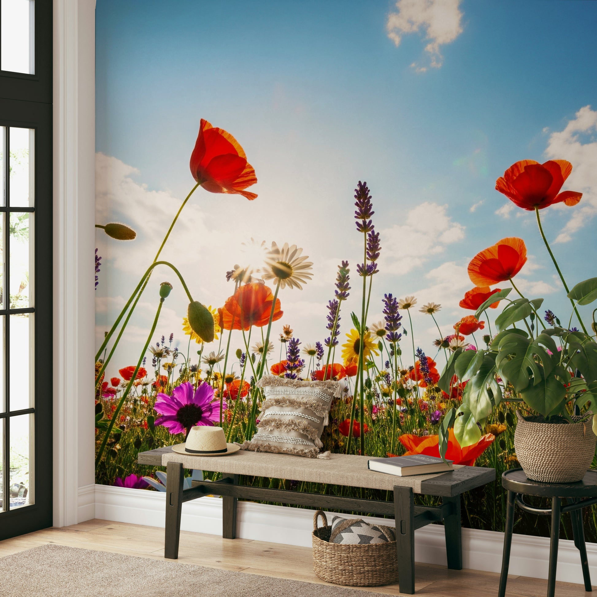 A full-wall mural of a serene meadow landscape.
