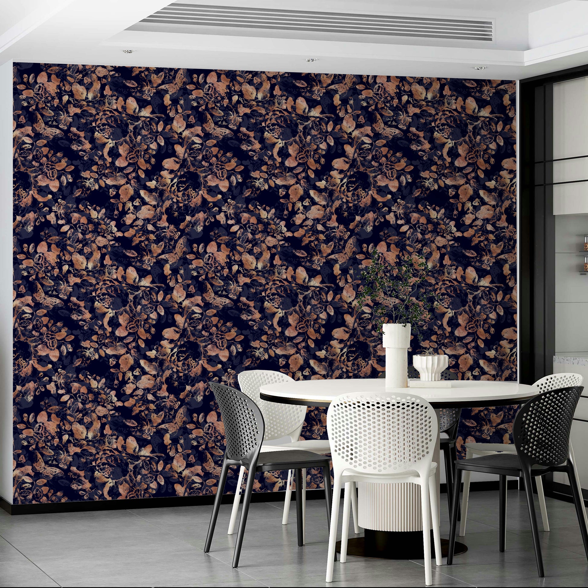 A sophisticated living room with dark floral wallpaper

