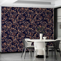 A sophisticated living room with dark floral wallpaper

