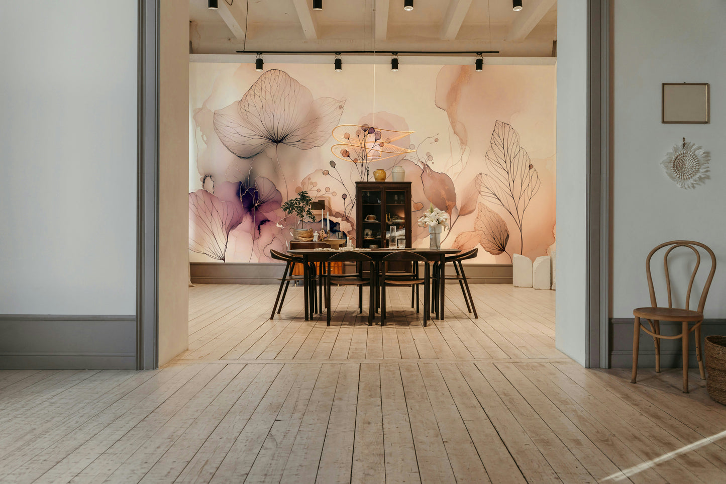 The colors are soft and muted, with shades of white, cream, and pale pink.
