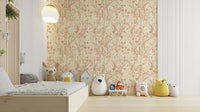 The soft, muted tones of the wallpaper design.

