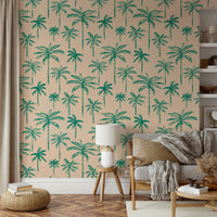 A living room wall covered in a lush, tropical palm tree wallpaper.

