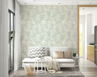 Palm leaf shapes wallpaper on a wall

