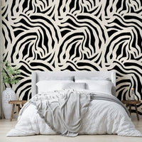 A creative workspace with a wavy lines mural

