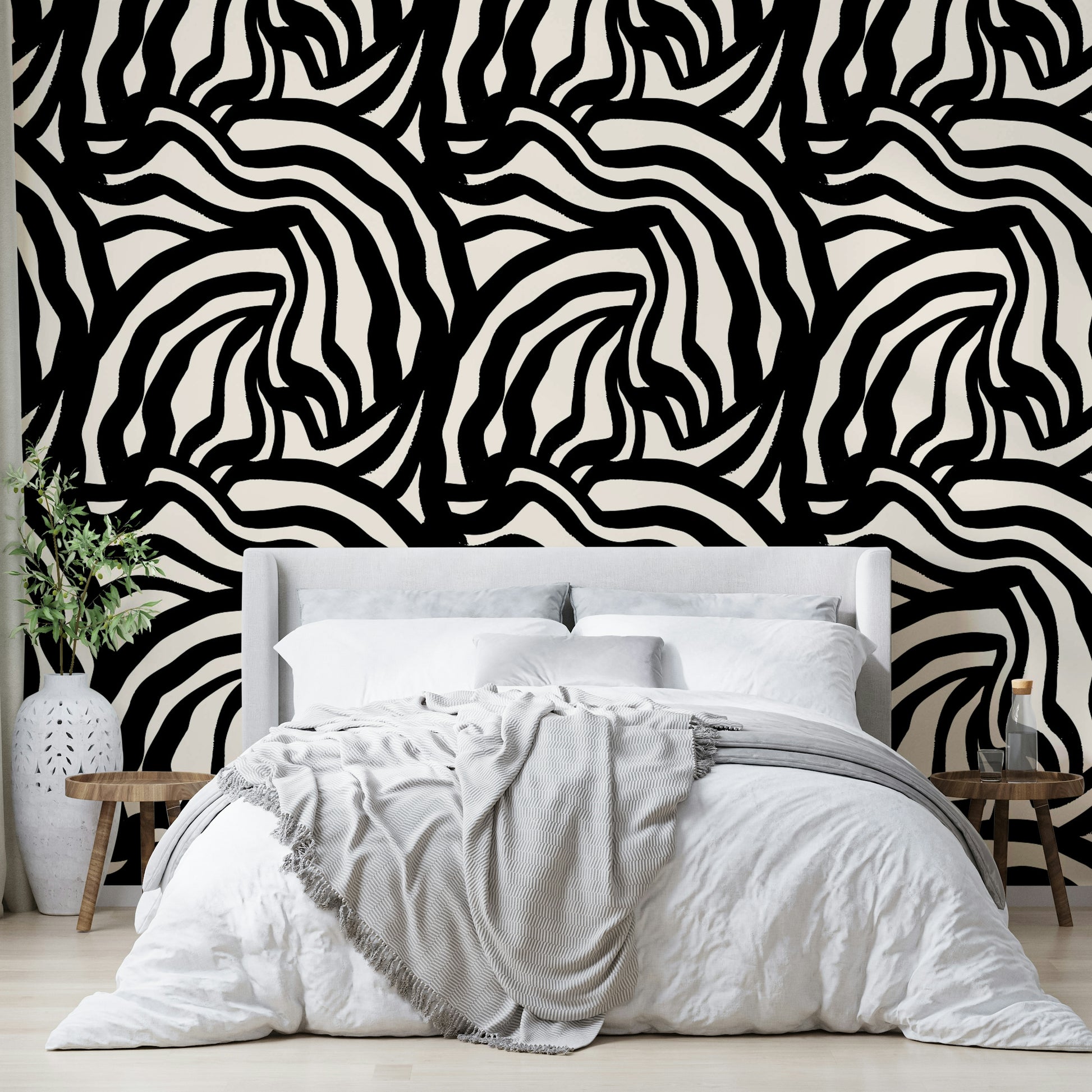 A close-up of a hand-painted wavy black lines wallpaper showing a brushstroke texture