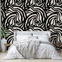 A close-up of a hand-painted wavy black lines wallpaper showing a brushstroke texture