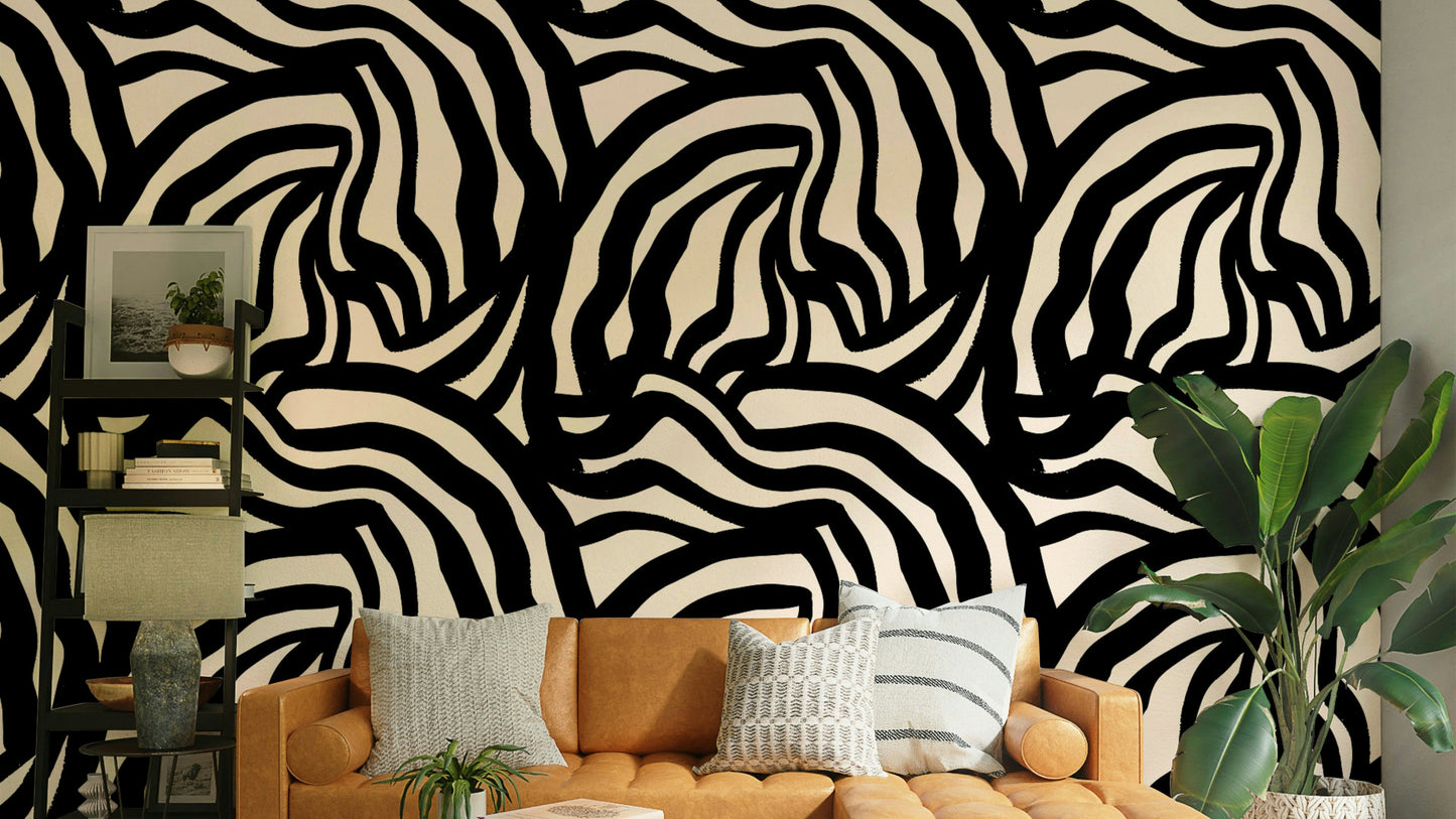 A full wall decorated with the wavy black lines wallpaper, styled in a minimalist room