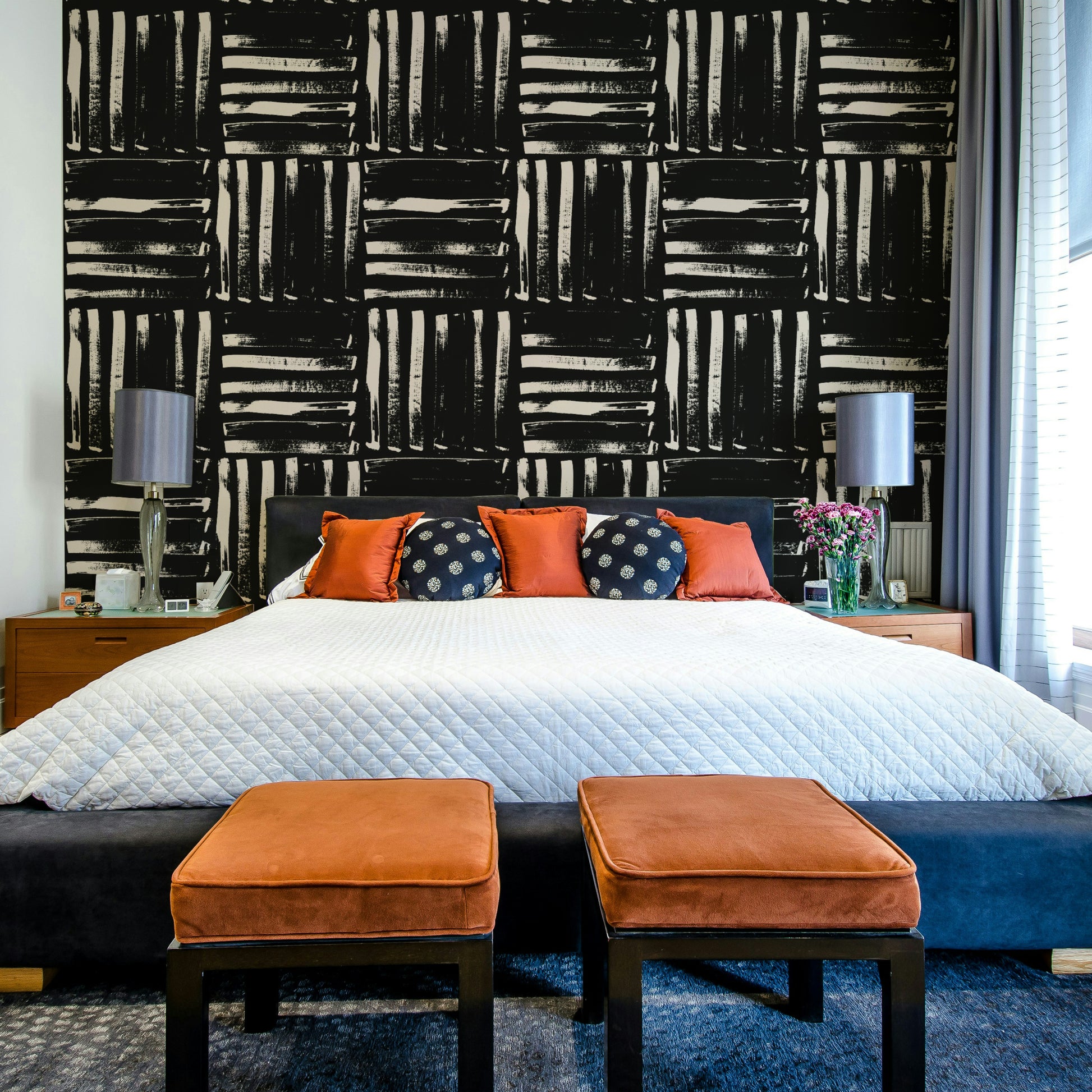 A child's room decorated with the painted stripes mural, in a playful color palette