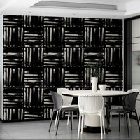 A bedroom with the wallpaper for walls, featuring vertical stripes to make the ceiling appear higher