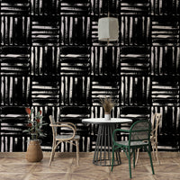 Detail of the wallpaper's texture and color variation in the painted lines