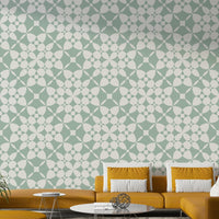 A corner of a room showcasing the wallpaper's full design.


