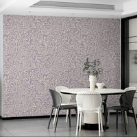 A corner of a room showcasing the wallpaper's full design.

